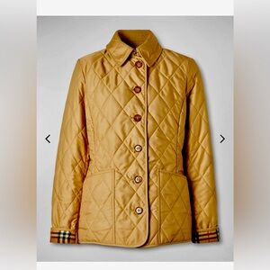 Never worn Burberry Women's Quilted Jacket
